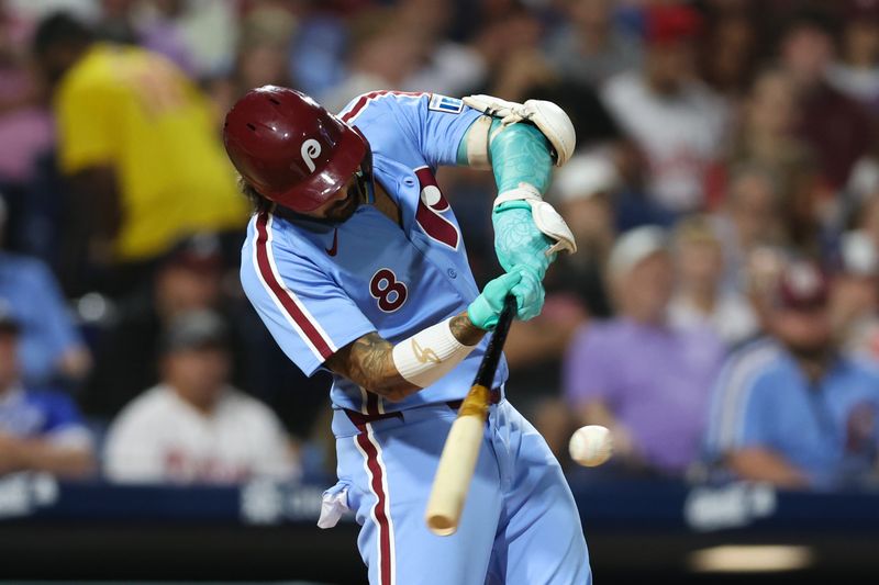 Aug 29, 2024; Philadelphia, Pennsylvania, USA; Philadelphia Phillies outfielder Nick Castellanos (8) hits a two RBI home run during the seventh inning against the Atlanta Braves at Citizens Bank Park. Mandatory Credit: Bill Streicher-USA TODAY Sports