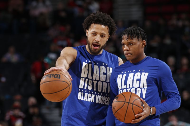 PORTLAND, OR - FEBRUARY 8: Cade Cunningham #2 and Marcus Sasser #25 of the Detroit Pistons warm up before the game against the Portland Trail Blazers on February 8, 2024 at the Moda Center Arena in Portland, Oregon. NOTE TO USER: User expressly acknowledges and agrees that, by downloading and or using this photograph, user is consenting to the terms and conditions of the Getty Images License Agreement. Mandatory Copyright Notice: Copyright 2024 NBAE (Photo by Cameron Browne/NBAE via Getty Images)