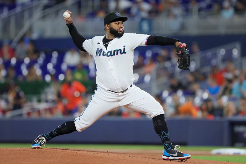 Aug 15, 2023; Miami, Florida, USA;  Miami Marlins starting pitcher Johnny Cueto (47) delivers a pitch against the Houston Astros during the first inning at loanDepot Park. Mandatory Credit: Sam Navarro-USA TODAY Sports