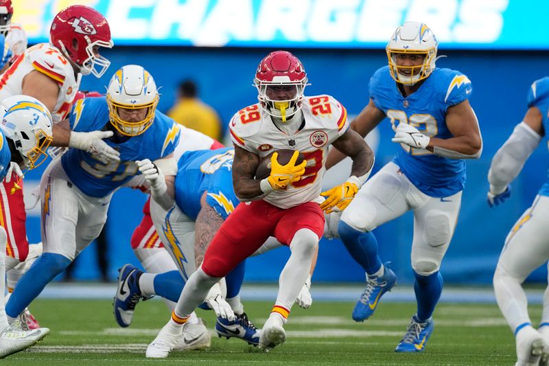 Kansas City Chiefs running back La'Mical Perine (29) runs the ball during an NFL football game against the Los Angeles Chargers Monday, Jan. 8, 2024, in Inglewood, Calif. (AP Photo/Ashley Landis)