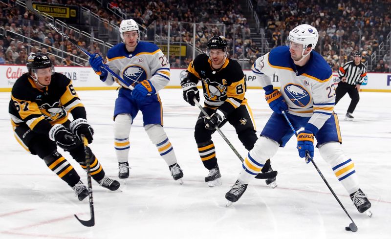 Jan 6, 2024; Pittsburgh, Pennsylvania, USA;  Buffalo Sabres defenseman Mattias Samuelsson (23) skates with the puck against the Pittsburgh Penguins during the second period at PPG Paints Arena. Mandatory Credit: Charles LeClaire-USA TODAY Sports