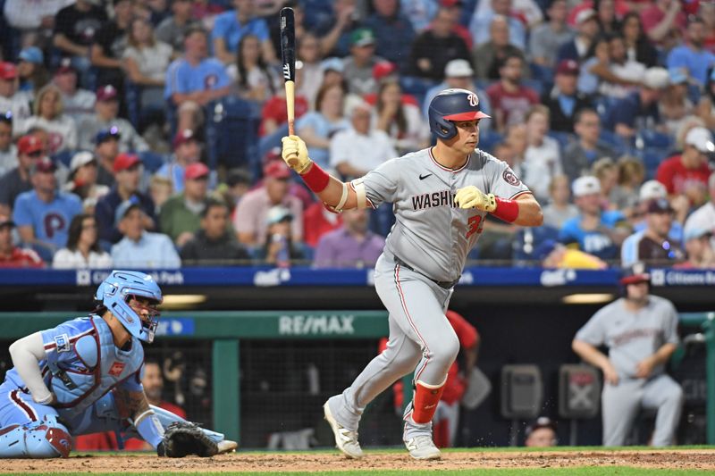 May 1, 2025; Philadelphia, Pennsylvania, USA;  Washington Nationals first base Nathaniel Lowe (33) hits an RBI single during the sixth inning against the Philadelphia Phillies at Citizens Bank Park. Mandatory Credit: Eric Hartline-Imagn Images