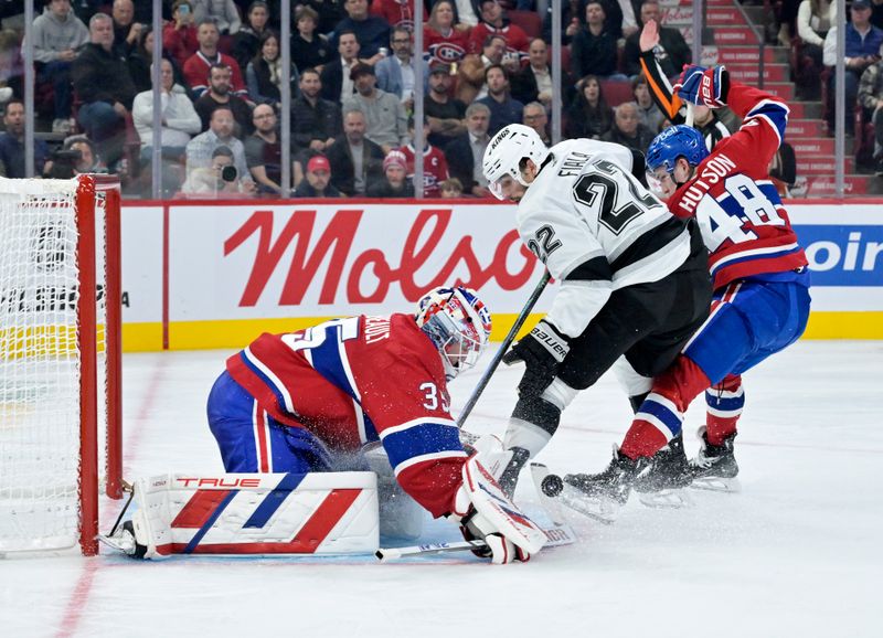 Oct 17, 2024; Montreal, Quebec, CAN; Montreal Canadiens goalie Sam Montembeault (35) stops Los Angeles Kings forward Kevin Fiala (22) during the third period at the Bell Centre. Mandatory Credit: Eric Bolte-Imagn Images