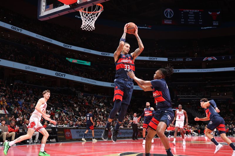 WASHINGTON, DC -? NOVEMBER 26: Kyle Kuzma #33 of the Washington Wizards rebounds the ball during the game against the Chicago Bulls during the Emirates NBA Cup game on November 26, 2024 at Capital One Arena in Washington, DC. NOTE TO USER: User expressly acknowledges and agrees that, by downloading and or using this Photograph, user is consenting to the terms and conditions of the Getty Images License Agreement. Mandatory Copyright Notice: Copyright 2024 NBAE (Photo by Stephen Gosling/NBAE via Getty Images)