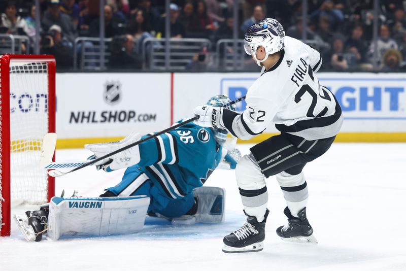 Dec 27, 2023; Los Angeles, California, USA; Los Angeles Kings left wing Kevin Fiala (22) scores a goal during the second period of a game against the San Jose Sharks at Crypto.com Arena. Mandatory Credit: Jessica Alcheh-USA TODAY Sports