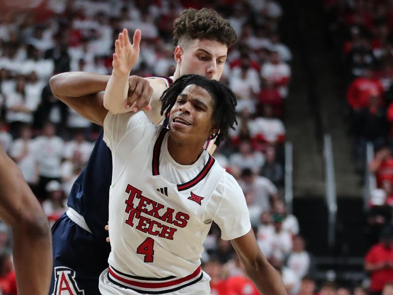 Jan 18, 2025; Lubbock, Texas, USA;  Texas Tech Red Raiders guard Christian Anderson (4) reacts after being fouled by Arizona Wildcats guard Anthony Dell’Orso (3) in the second half at United Supermarkets Arena. Mandatory Credit: Michael C. Johnson-Imagn Images