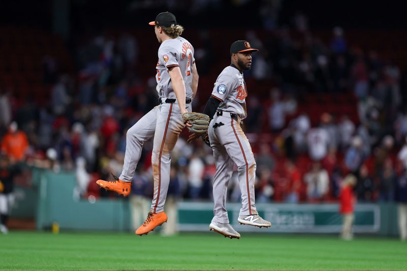 Sep 10, 2024; Boston, Massachusetts, USA; Baltimore Orioles center fielder Cedric Mullins (31) celebrates with Baltimore Orioles shortstop Gunnar Henderson (2) after defeating the Boston Red Sox at Fenway Park. Mandatory Credit: Paul Rutherford-Imagn Images