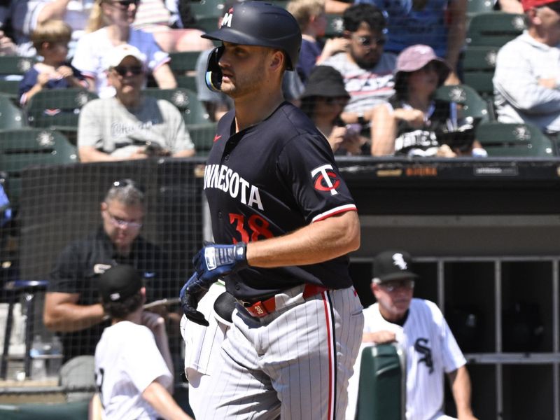 Jul 10, 2024; Chicago, Illinois, USA;   Minnesota Twins outfielder Matt Wallner (38) crosses home plate after hitting a home run against the Chicago White Sox during the seventh inning at Guaranteed Rate Field. Mandatory Credit: Matt Marton-USA TODAY Sports