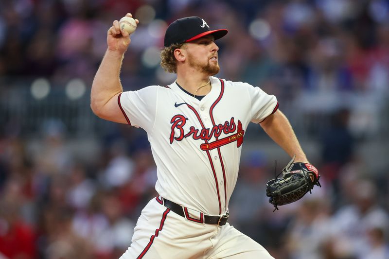 Sep 24, 2024; Atlanta, Georgia, USA; Atlanta Braves starting pitcher Spencer Schwellenbach (56) throws against the New York Mets in the first inning at Truist Park. Mandatory Credit: Brett Davis-Imagn Images
