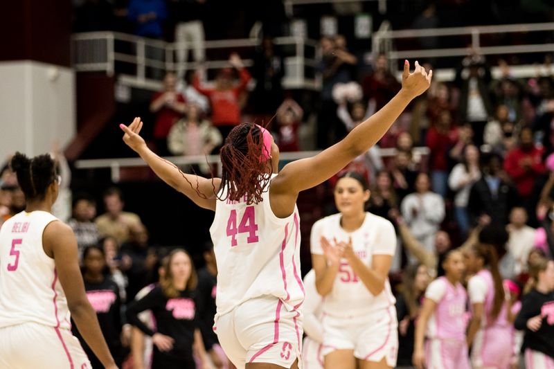 Feb 17, 2023; Stanford, California, USA;  Stanford Cardinal forward Kiki Iriafen (44) and other players celebrate their defeat of the USC Trojans at Maples Pavilion. Mandatory Credit: John Hefti-USA TODAY Sports