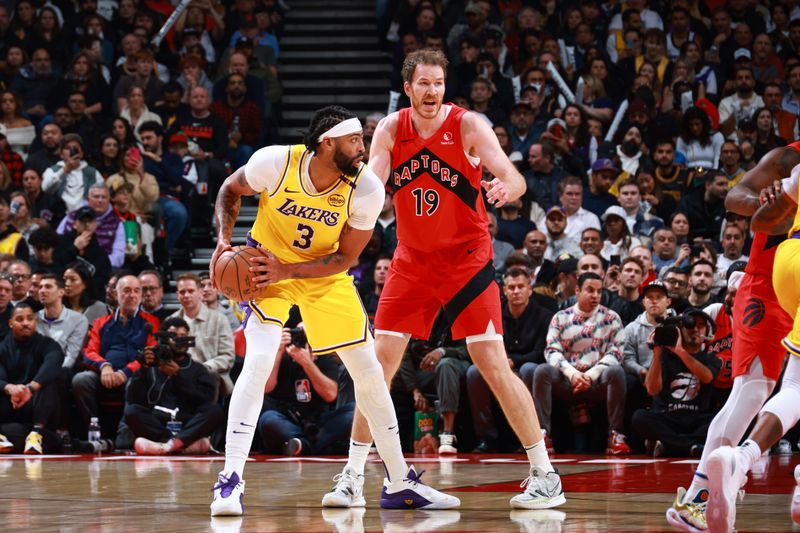 TORONTO, CANADA - NOVEMBER 1: Anthony Davis #3 of the Los Angeles Lakers looks on during the game against the Toronto Raptors on November 1, 2024 at the Scotiabank Arena in Toronto, Ontario, Canada.  NOTE TO USER: User expressly acknowledges and agrees that, by downloading and or using this Photograph, user is consenting to the terms and conditions of the Getty Images License Agreement.  Mandatory Copyright Notice: Copyright 2024 NBAE (Photo by Vaughn Ridley/NBAE via Getty Images)