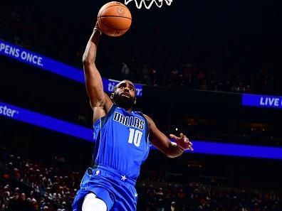 PHOENIX, AZ - DECEMBER 25: Tim Hardaway Jr. #10 of the Dallas Mavericks dunks the ball during the game against the Phoenix Suns on December 25, 2023 at Footprint Center in Phoenix, Arizona. NOTE TO USER: User expressly acknowledges and agrees that, by downloading and or using this photograph, user is consenting to the terms and conditions of the Getty Images License Agreement. Mandatory Copyright Notice: Copyright 2023 NBAE (Photo by Barry Gossage/NBAE via Getty Images)