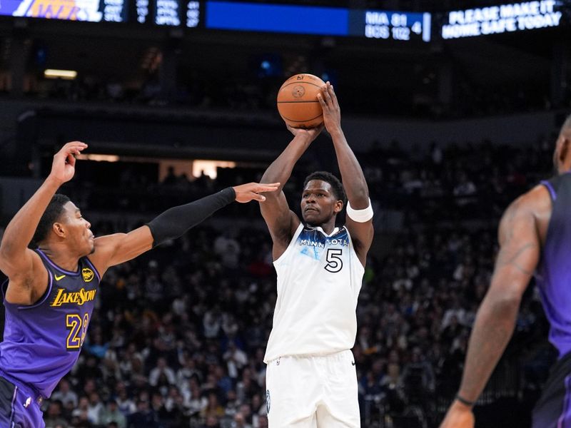 MINNEAPOLIS, MN - DECEMBER 2: Anthony Edwards #5 of the Minnesota Timberwolves shoots a three point basket during the game against the Los Angeles Lakers on December 2, 2024 at Target Center in Minneapolis, Minnesota. NOTE TO USER: User expressly acknowledges and agrees that, by downloading and or using this Photograph, user is consenting to the terms and conditions of the Getty Images License Agreement. Mandatory Copyright Notice: Copyright 2024 NBAE (Photo by Jordan Johnson/NBAE via Getty Images)