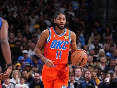 DENVER, CO - DECEMBER 16: Isaiah Joe #11 of the Oklahoma City Thunder brings the ball up court against the Denver Nuggets on December 16, 2023 at the Ball Arena in Denver, Colorado. NOTE TO USER: User expressly acknowledges and agrees that, by downloading and/or using this Photograph, user is consenting to the terms and conditions of the Getty Images License Agreement. Mandatory Copyright Notice: Copyright 2023 NBAE (Photo by Garrett Ellwood/NBAE via Getty Images)