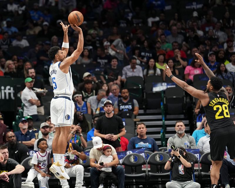 DALLAS, TX - OCTOBER 10: Quentin Grimes #5 of the Dallas Mavericks shoots a three point basket during the game against the Utah Jazz on October 10, 2024 at American Airlines Center in Dallas, Texas. NOTE TO USER: User expressly acknowledges and agrees that, by downloading and or using this photograph, User is consenting to the terms and conditions of the Getty Images License Agreement. Mandatory Copyright Notice: Copyright 2024 NBAE (Photo by Glenn James/NBAE via Getty Images)