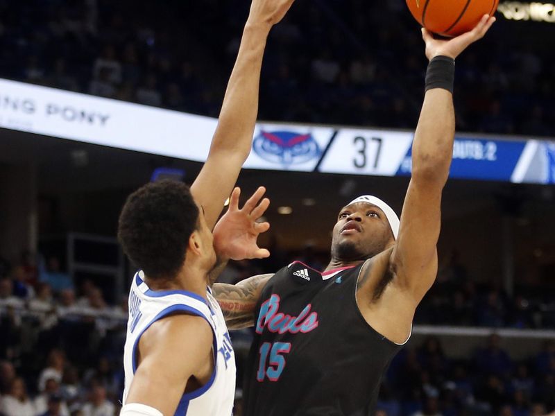 Feb 25, 2024; Memphis, Tennessee, USA; Florida Atlantic Owls guard Alijah Martin (15) shoots as Memphis Tigers forward Nicholas Jourdain (2) defends during the second half at FedExForum. Mandatory Credit: Petre Thomas-USA TODAY Sports