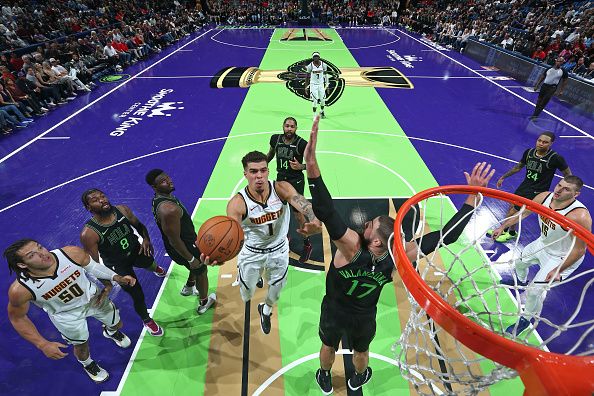 NEW ORLEANS, LA - NOVEMBER 17: Michael Porter Jr. #1 of the Denver Nuggets drives to the basket during the game against the New Orleans Pelicans during the In-Season Tournament on November 17, 2023 at the Smoothie King Center in New Orleans, Louisiana. NOTE TO USER: User expressly acknowledges and agrees that, by downloading and or using this Photograph, user is consenting to the terms and conditions of the Getty Images License Agreement. Mandatory Copyright Notice: Copyright 2023 NBAE (Photo by Layne Murdoch Jr./NBAE via Getty Images)