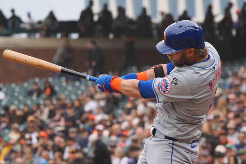 Apr 24, 2024; San Francisco, California, USA; New York Mets second baseman Jeff McNeil (1) hits an RBI double against the San Francisco Giants during the fifth inning at Oracle Park. Mandatory Credit: Kelley L Cox-USA TODAY Sports