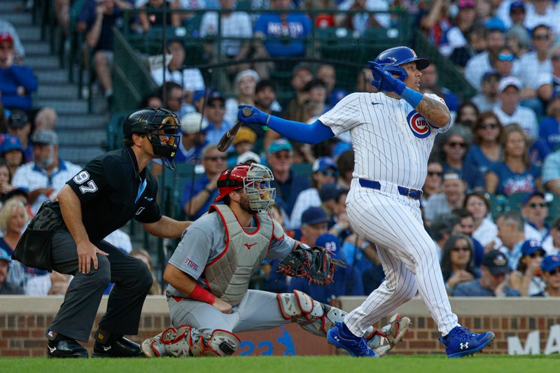 Sep 28, 2025; Chicago, Illinois, USA; Chicago Cubs catcher Moises Ballesteros (25) hits an RBI-single against the St. Louis Cardinals during the seventh inning at Wrigley Field. Mandatory Credit: Kamil Krzaczynski-Imagn Images