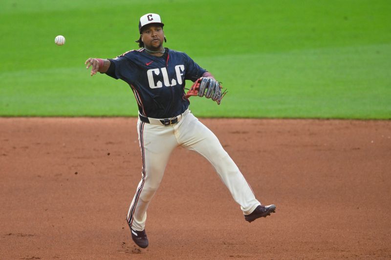 Jun 18, 2024; Cleveland, Ohio, USA; Cleveland Guardians third baseman Jose Ramirez (11) throws to first base in the fourth inning against the Seattle Mariners at Progressive Field. Mandatory Credit: David Richard-USA TODAY Sports