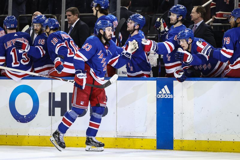 Apr 7, 2024; New York, New York, USA;  New York Rangers center Mika Zibanejad (93) celebrates with his teammates after scoring a goal in the third period against the Montreal Canadiens at Madison Square Garden. Mandatory Credit: Wendell Cruz-USA TODAY Sports