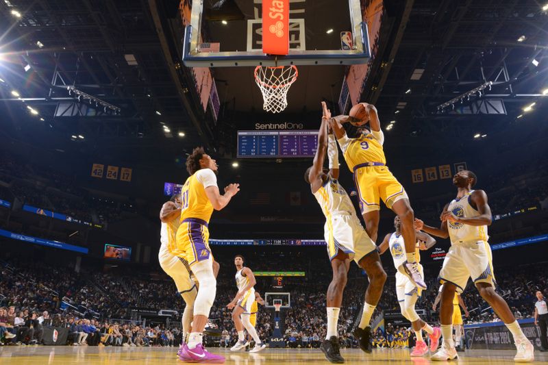 SAN FRANCISCO, CA - OCTOBER 18: Bronny James #9 of the Los Angeles Lakers shoots the ball during the game against the Golden State Warriors during a NBA Preseason game on October 18, 2024 at Chase Center in San Francisco, California. NOTE TO USER: User expressly acknowledges and agrees that, by downloading and or using this photograph, user is consenting to the terms and conditions of Getty Images License Agreement. Mandatory Copyright Notice: Copyright 2024 NBAE (Photo by Noah Graham/NBAE via Getty Images)