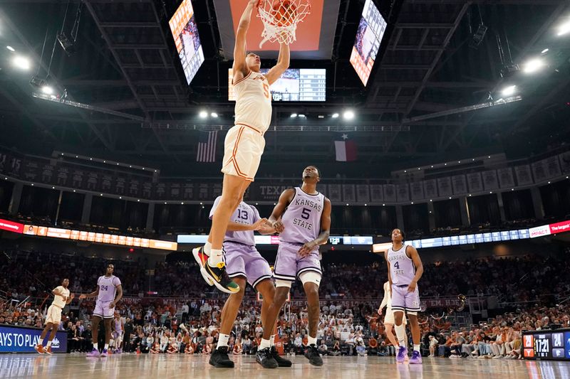 Feb 19, 2024; Austin, Texas, USA; Texas Longhorns forward Kadin Shedrick (5) dunks over Kansas State Wildcats guard Cam Carter (5) during the second half at Moody Center. Mandatory Credit: Scott Wachter-USA TODAY Sports