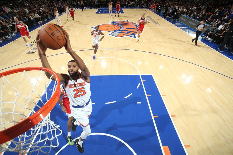 NEW YORK, NY - OCTOBER 9: Mikal Bridges #25 of the New York Knicks drives to the basket during the game against the Washington Wizards during the 2024 NBA Preseason on October 9, 2024 at Madison Square Garden in New York City, New York.  NOTE TO USER: User expressly acknowledges and agrees that, by downloading and or using this photograph, User is consenting to the terms and conditions of the Getty Images License Agreement. Mandatory Copyright Notice: Copyright 2024 NBAE  (Photo by Nathaniel S. Butler/NBAE via Getty Images)