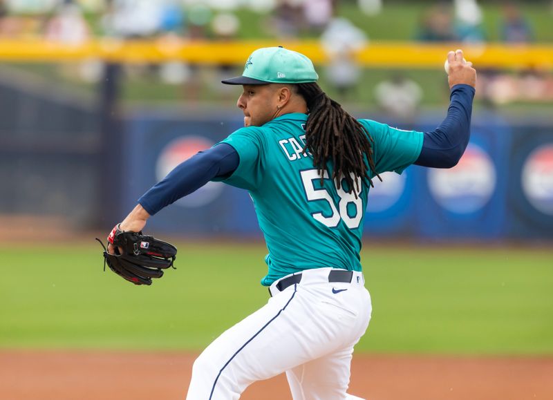 Mar 3, 2025; Peoria, Arizona, USA; Seattle Mariners pitcher Luis Castillo against the Cleveland Guardians during a spring training game at Peoria Sports Complex. Mandatory Credit: Mark J. Rebilas-Imagn Images