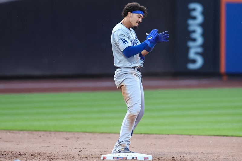 May 29, 2024; New York City, New York, USA;  Los Angeles Dodgers left fielder Miguel Vargas (27) reacts after hitting a two run double in the eighth inning against the New York Mets at Citi Field. Mandatory Credit: Wendell Cruz-USA TODAY Sports