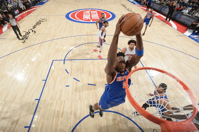 DETROIT, MI - MAY 1: OG Anunoby #8 of the New York Knicks dunks the ball during the game against the Detroit Pistons during Round 1 Game 6 of the 2025 NBA Playoffs on May 1, 2025 at Little Caesars Arena in Detroit, Michigan. NOTE TO USER: User expressly acknowledges and agrees that, by downloading and/or using this photograph, User is consenting to the terms and conditions of the Getty Images License Agreement. Mandatory Copyright Notice: Copyright 2025 NBAE (Photo by Chris Schwegler/NBAE via Getty Images)