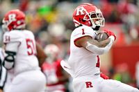 Can Rutgers Scarlet Knights Outmaneuver Illinois Fighting Illini in a Pivotal Clash?