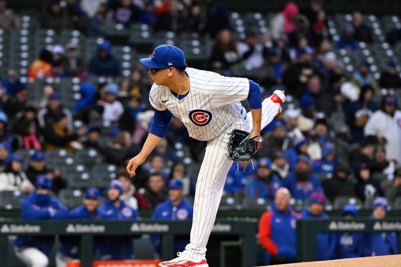 Apr 2, 2024; Chicago, Illinois, USA; Chicago Cubs starting pitcher Javier Assad (72) delivers against the Colorado Rockies during the first inning at Wrigley Field. Mandatory Credit: Matt Marton-USA TODAY Sports