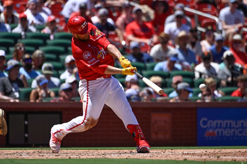 Jun 23, 2024; St. Louis, Missouri, USA; St. Louis Cardinals catcher Pedro Pages (43) hits a single against the San Francisco Giants in the fourth inning at Busch Stadium. Mandatory Credit: Joe Puetz-USA TODAY Sports