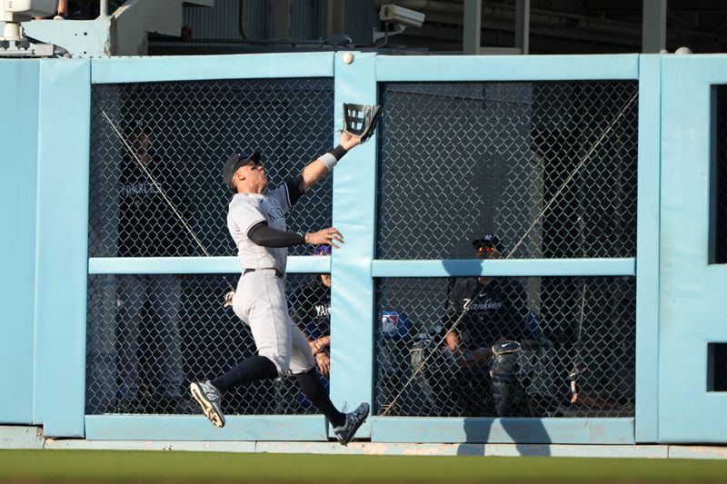 Jun 3, 2023; Los Angeles, California, USA; New York Yankees right fielder Aaron Judge (99) catches a fly ball by Los Angeles Dodgers designated hitter J.D. Martinez (28) in the eighth inning at Dodger Stadium. Mandatory Credit: Kirby Lee-USA TODAY Sports