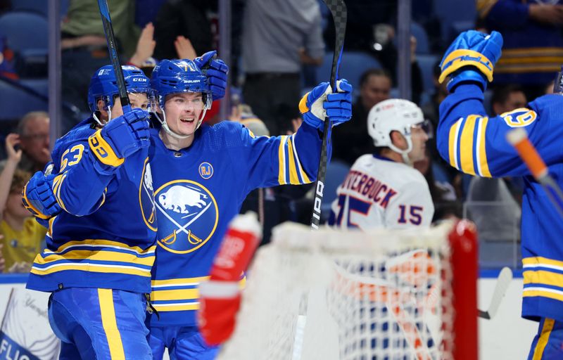 Mar 14, 2024; Buffalo, New York, USA;  Buffalo Sabres left wing Victor Olofsson (71) celebrates his goal with teammates during the second period against the New York Islanders at KeyBank Center. Mandatory Credit: Timothy T. Ludwig-USA TODAY Sports