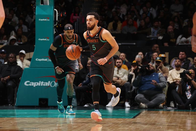 WASHINGTON, DC -? FEBRUARY 4: Tyus Jones #5 of the Washington Wizards dribbles the ball during the game against the Phoenix Suns on February 4, 2024 at Capital One Arena in Washington, DC. NOTE TO USER: User expressly acknowledges and agrees that, by downloading and or using this Photograph, user is consenting to the terms and conditions of the Getty Images License Agreement. Mandatory Copyright Notice: Copyright 2024 NBAE (Photo by Stephen Gosling/NBAE via Getty Images)