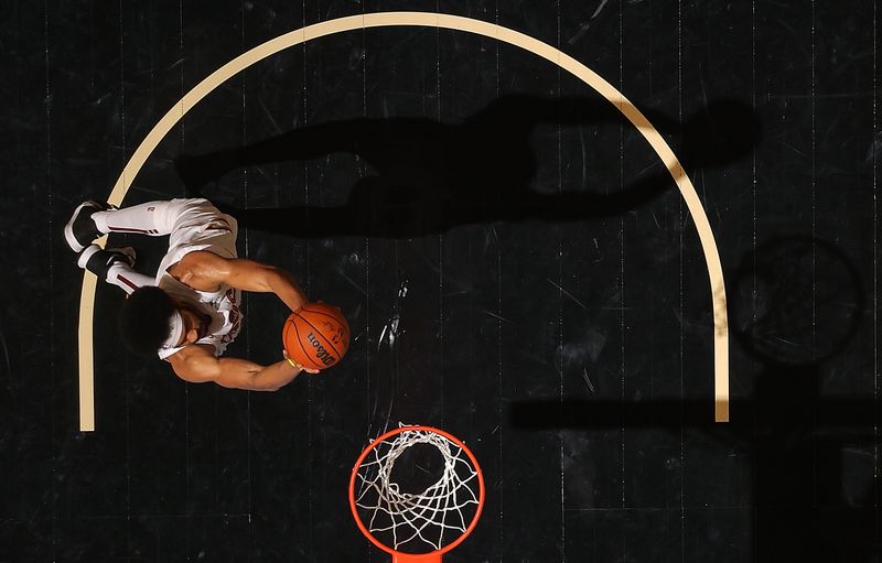 ATLANTA, GEORGIA - MARCH 06:  Jarrett Allen #31 of the Cleveland Cavaliers attacks the basket against the Atlanta Hawks during the fourth quarter at State Farm Arena on March 06, 2024 in Atlanta, Georgia.  NOTE TO USER: User expressly acknowledges and agrees that, by downloading and/or using this photograph, user is consenting to the terms and conditions of the Getty Images License Agreement.  (Photo by Kevin C. Cox/Getty Images)