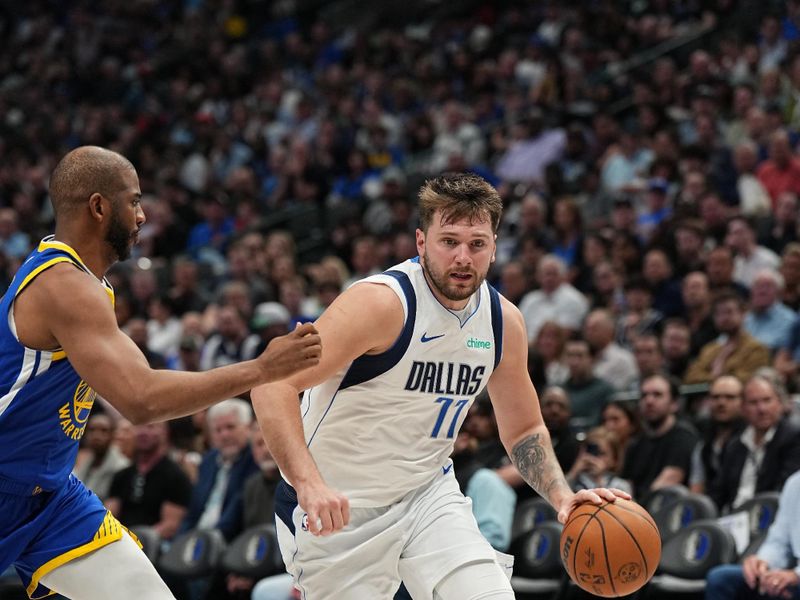 DALLAS, TX - MARCH 13: Luka Doncic #77 of the Dallas Mavericks dribbles the ball during the game against the Golden State Warriors on March 13, 2024 at the American Airlines Center in Dallas, Texas. NOTE TO USER: User expressly acknowledges and agrees that, by downloading and or using this photograph, User is consenting to the terms and conditions of the Getty Images License Agreement. Mandatory Copyright Notice: Copyright 2024 NBAE (Photo by Glenn James/NBAE via Getty Images)