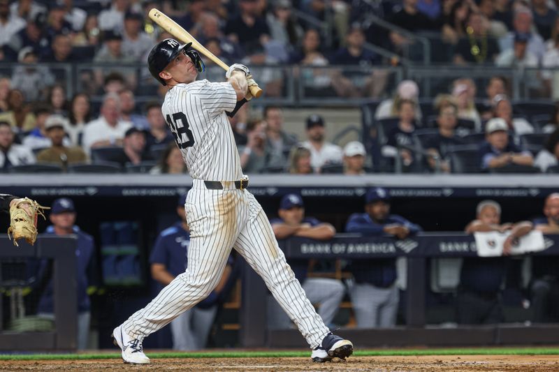 May 2, 2025; Bronx, New York, USA; New York Yankees first baseman Paul Goldschmidt (48) hits a three run home run during the fifth inning against the Tampa Bay Rays at Yankee Stadium. Mandatory Credit: Vincent Carchietta-Imagn Images