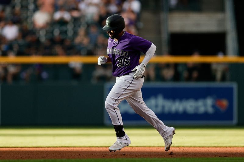 Aug 18, 2023; Denver, Colorado, USA; Colorado Rockies catcher Elias Diaz (35) rounds the bases on a two run home run in the first inning against the Chicago White Sox at Coors Field. Mandatory Credit: Isaiah J. Downing-USA TODAY Sports