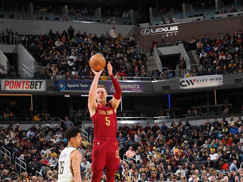 INDIANAPOLIS, IN - MARCH 18:  Sam Merrill #5 of the Cleveland Cavaliers shoots a 3-point basket during the game  on March 18, 2024 at Gainbridge Fieldhouse in Indianapolis, Indiana. NOTE TO USER: User expressly acknowledges and agrees that, by downloading and or using this Photograph, user is consenting to the terms and conditions of the Getty Images License Agreement. Mandatory Copyright Notice: Copyright 2024 NBAE (Photo by Ron Hoskins/NBAE via Getty Images)