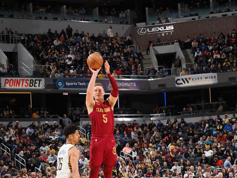 INDIANAPOLIS, IN - MARCH 18:  Sam Merrill #5 of the Cleveland Cavaliers shoots a 3-point basket during the game  on March 18, 2024 at Gainbridge Fieldhouse in Indianapolis, Indiana. NOTE TO USER: User expressly acknowledges and agrees that, by downloading and or using this Photograph, user is consenting to the terms and conditions of the Getty Images License Agreement. Mandatory Copyright Notice: Copyright 2024 NBAE (Photo by Ron Hoskins/NBAE via Getty Images)