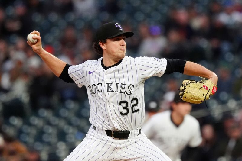 May 7, 2025; Denver, Colorado, USA; Colorado Rockies starting pitcher Chase Dollander (32) delivers a pitch in the fourth inning against the Detroit Tigers at Coors Field. Mandatory Credit: Ron Chenoy-Imagn Images