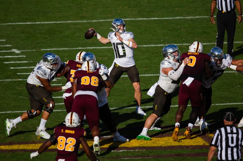 Nov 18, 2023; Tempe, Arizona, USA; Oregon Ducks quarterback Bo Nix (10) against the Arizona State Sun Devils at Mountain America Stadium. Mandatory Credit: Mark J. Rebilas-USA TODAY Sports