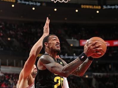 CHICAGO, IL - NOVEMBER 6: John Collins #20 of the Utah Jazz drives to the basket during the game against the Chicago Bulls on November 6, 2023 at the United Center in Chicago, Illinois. NOTE TO USER: User expressly acknowledges and agrees that, by downloading and or using this Photograph, user is consenting to the terms and conditions of the Getty Images License Agreement. Mandatory Copyright Notice: Copyright 2023 NBAE (Photo by Gary Dineen/NBAE via Getty Images).