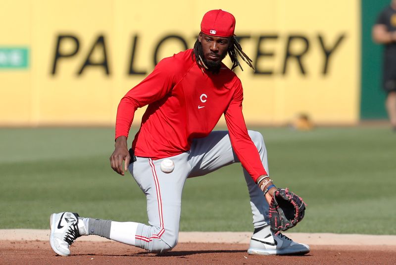 Aug 23, 2024; Pittsburgh, Pennsylvania, USA;  Cincinnati Reds shortstop Elly De La Cruz (44) takes ground balls before a game against the Pittsburgh Pirates att PNC Park. Mandatory Credit: Charles LeClaire-USA TODAY Sports