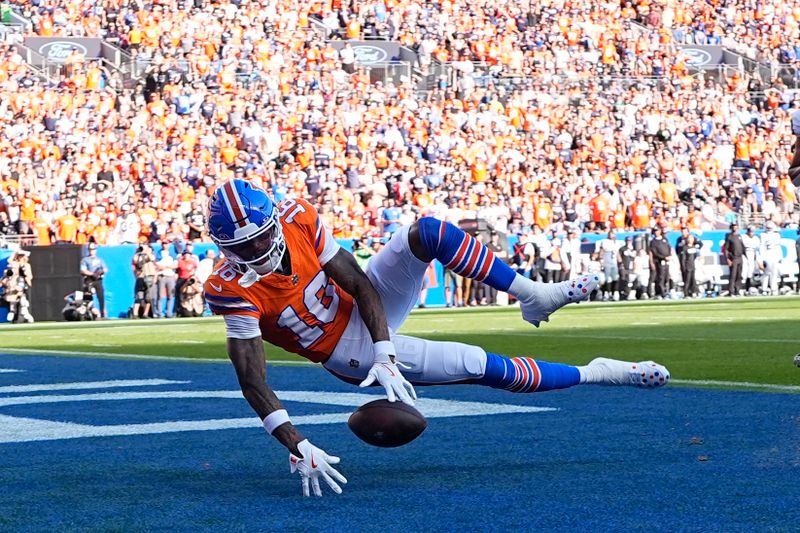 Denver Broncos wide receiver Troy Franklin drops a pass in the endzone during the second half of an NFL football game against the Las Vegas Raiders, Sunday, Oct. 6, 2024, in Denver. (AP Photo/David Zalubowski)