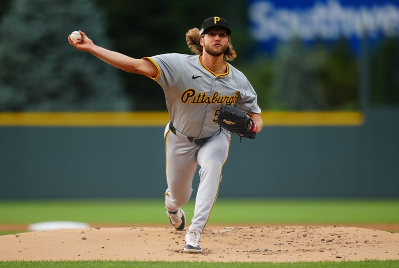 Jun 14, 2024; Denver, Colorado, USA; Pittsburgh Pirates starting pitcher Carmen Mlodzinski (50) delivers a pitch in the first inning against the Colorado Rockies at Coors Field. Mandatory Credit: Ron Chenoy-USA TODAY Sports