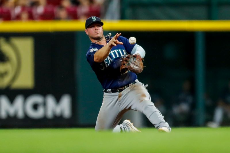 Sep 5, 2023; Cincinnati, Ohio, USA; Seattle Mariners first baseman Ty France (23) throws to first to get Cincinnati Reds right fielder Will Benson (not pictured) out in the sixth inning at Great American Ball Park. Mandatory Credit: Katie Stratman-USA TODAY Sports